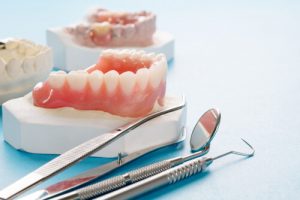 can you eat chips with partial dentures importance